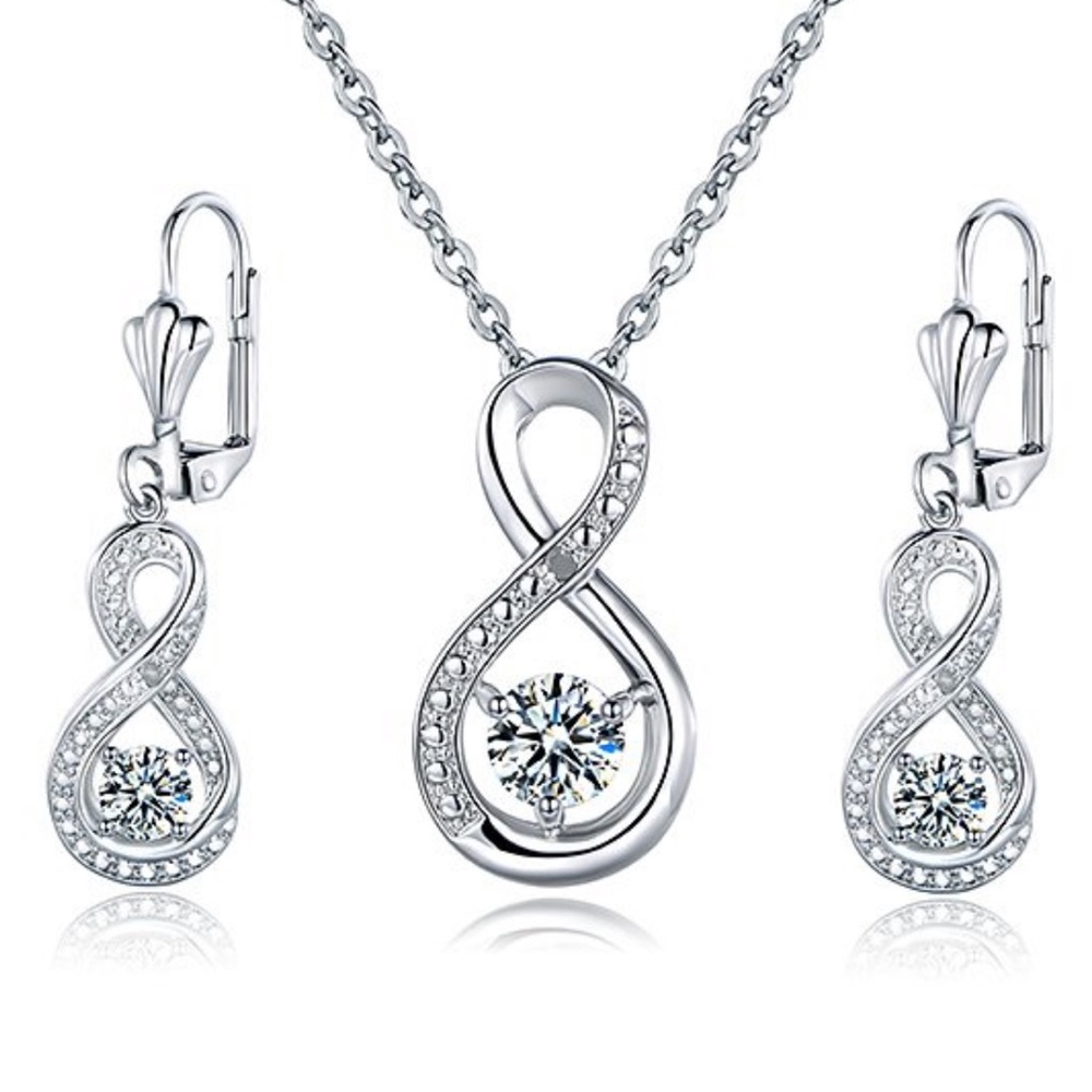 White topaz pendant necklace and drop earrings